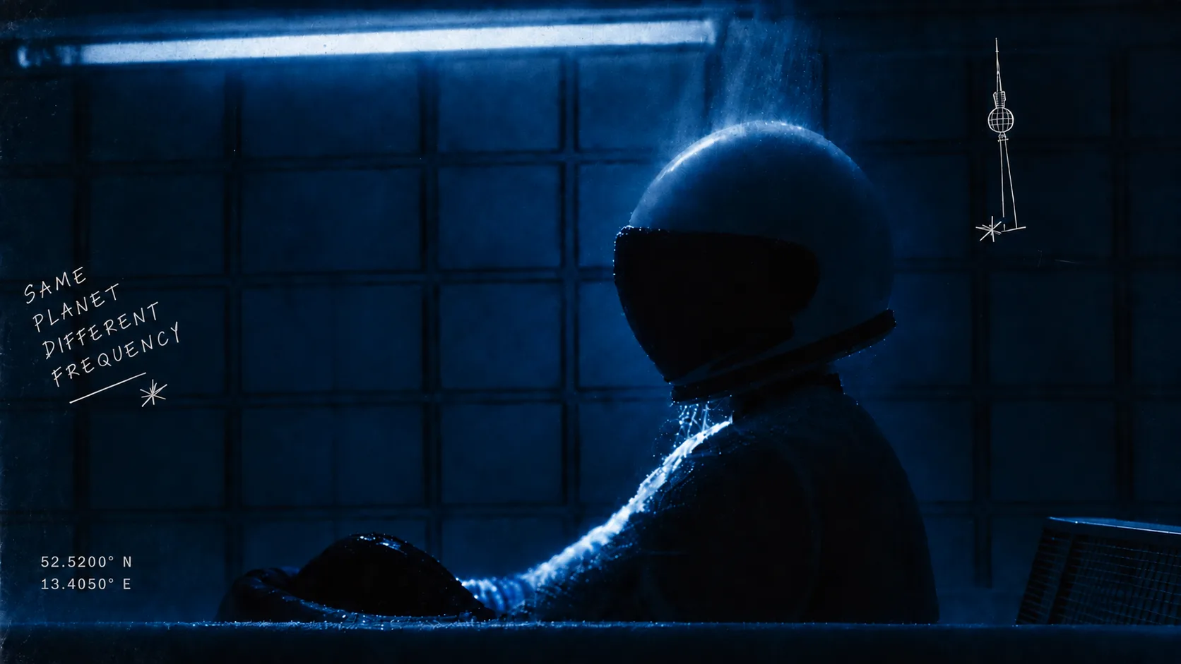 Drooving wearing an astronaut helmet, lit by blue light
